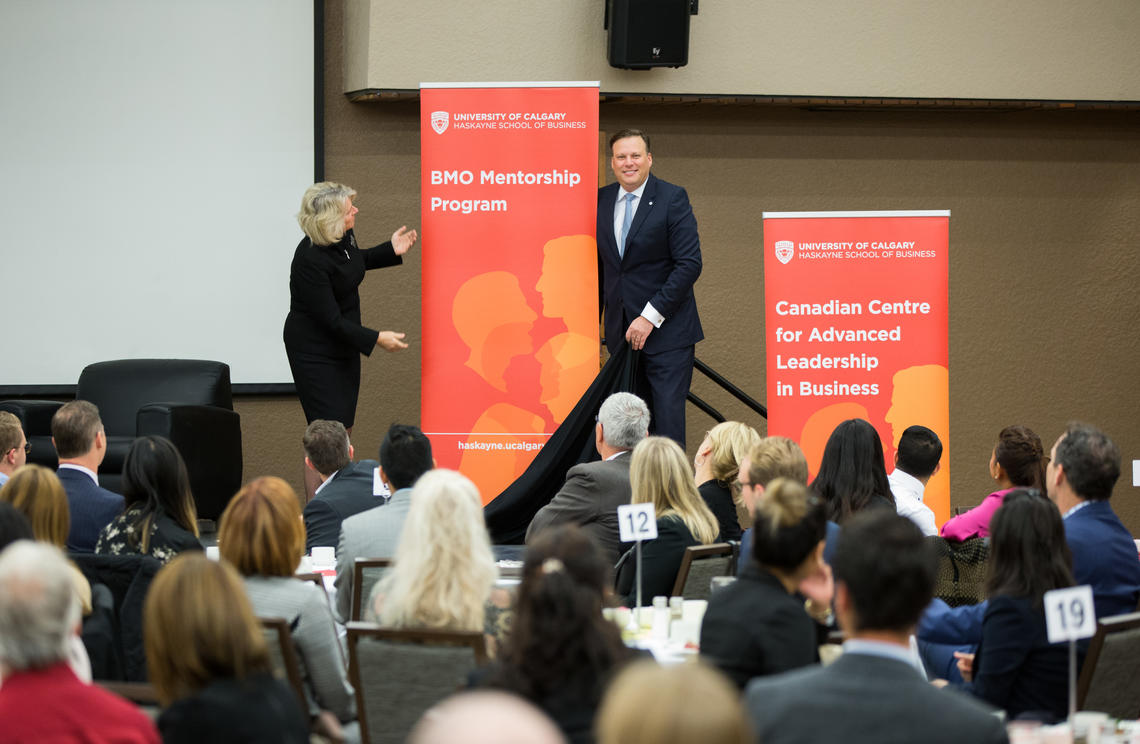 Elizabeth Cannon and John MacAulay unveil the BMO Mentorship Program at the Haskayne School of Business.