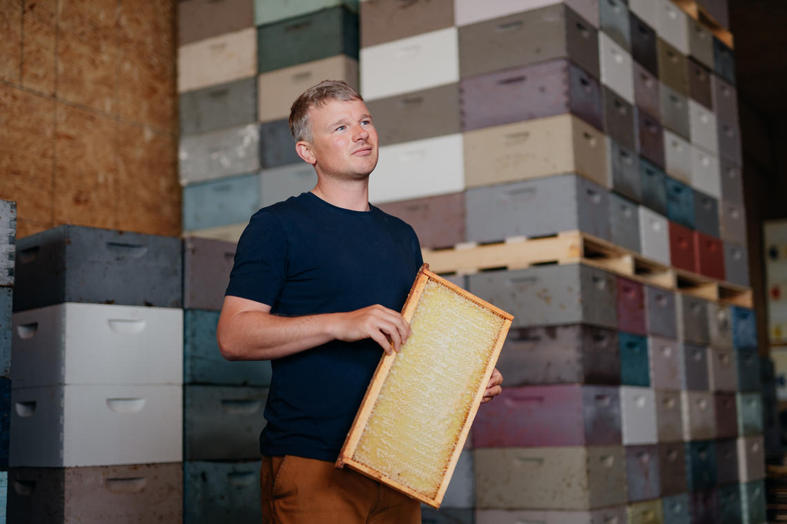 Man in warehouse  thinking