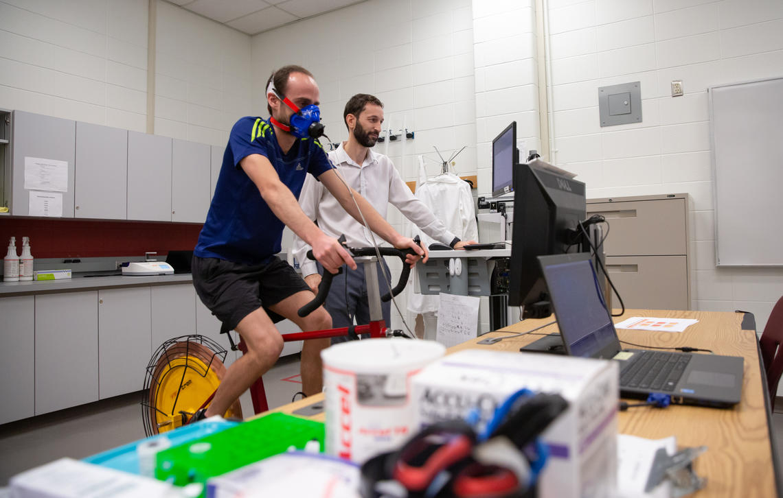 Associate professor Juan Murias monitors Danilo Iannetta during a workout.