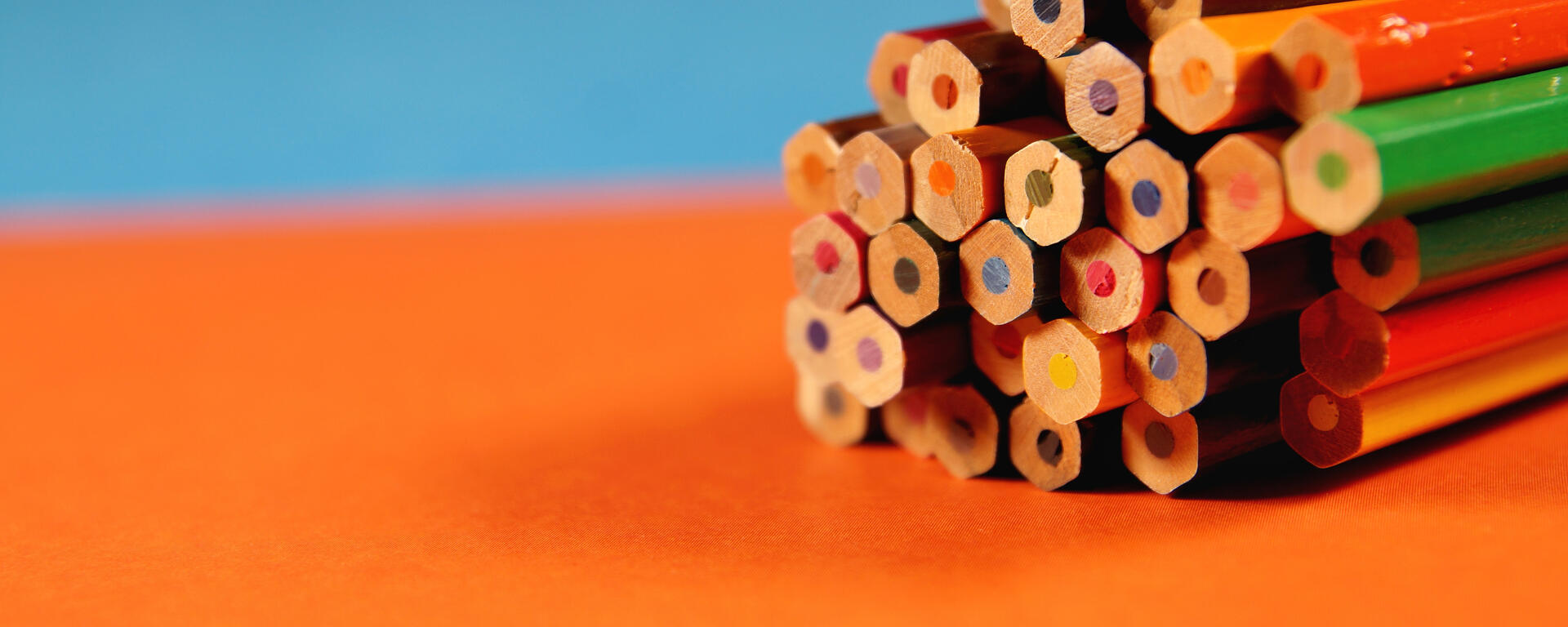 Stacked pencil crayons sybolize the many tools and modalities that can be used to achieve universal design for learning 