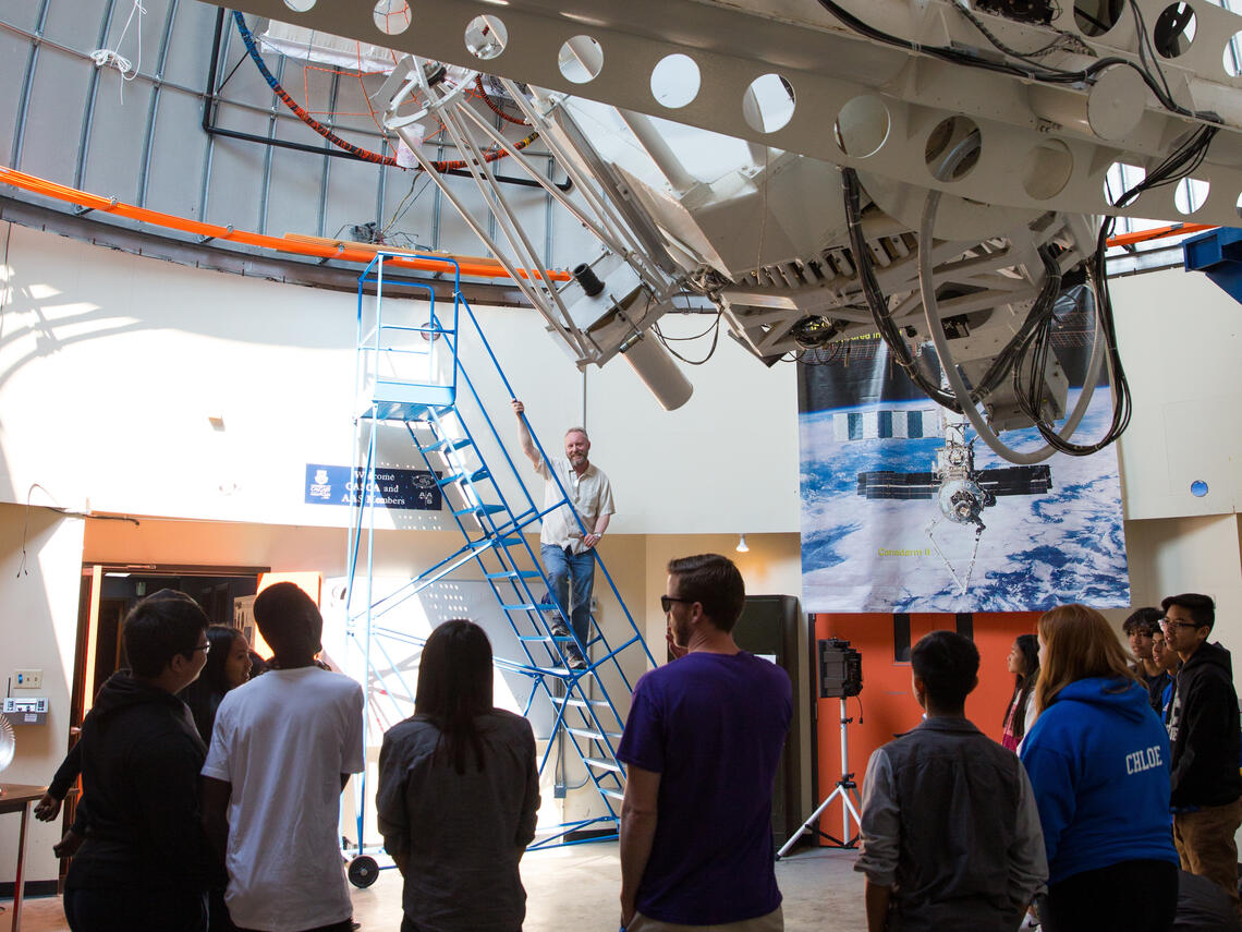Students from a rural junior high school tour the University of Calgary’s Rothney Astrophysical Observatory.