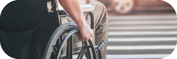 Toward a more accessible Canada: Urban and digital design Person in a wheelchair about to cross the street