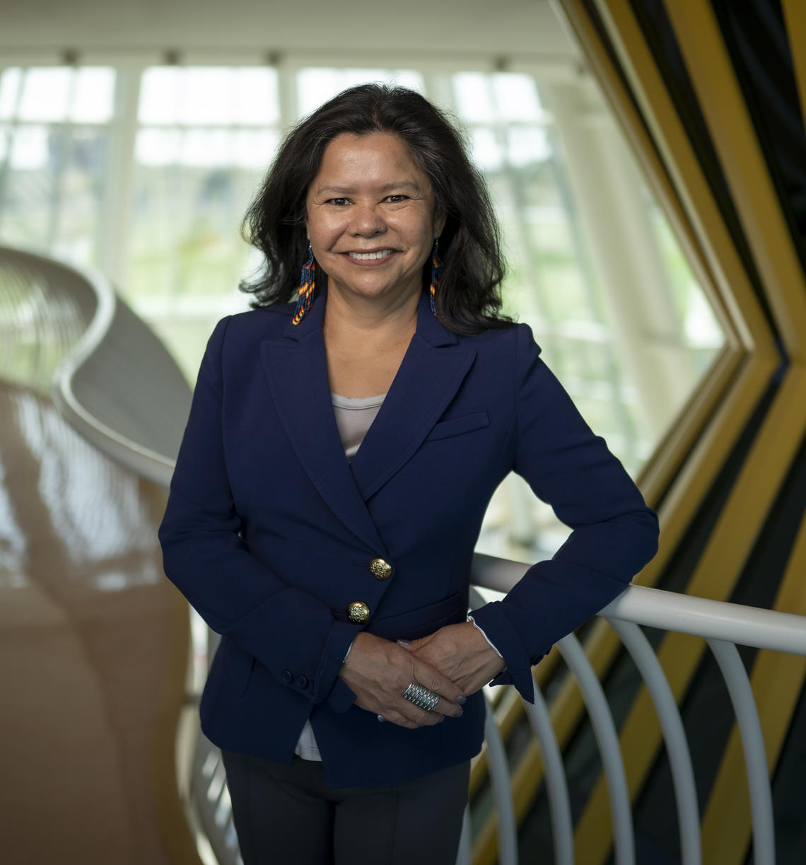 Dr. Jacqueline Ottmann stands inside the First Nations University of Canada