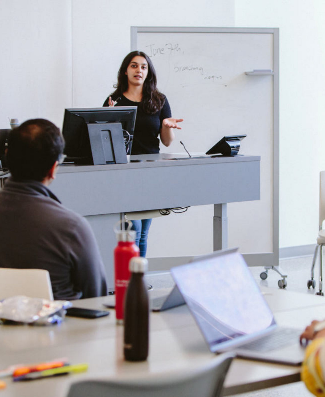 A student presents in a classroom