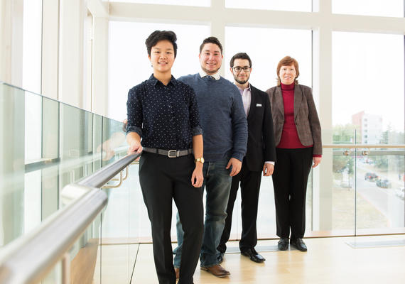 People standing in TI building