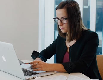 Female student working on a laptop